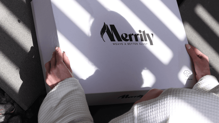 Merrily box being opened, showcasing premium bedding craftsmanship with Turkish cotton.