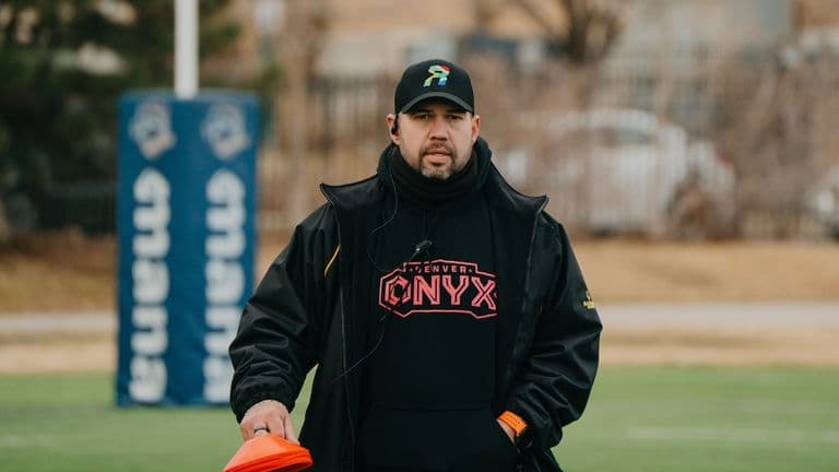 Coach Rob Quickfall guiding players at SAFFA RUGBY, a youth program focused on leadership, teamwork, and resilience.