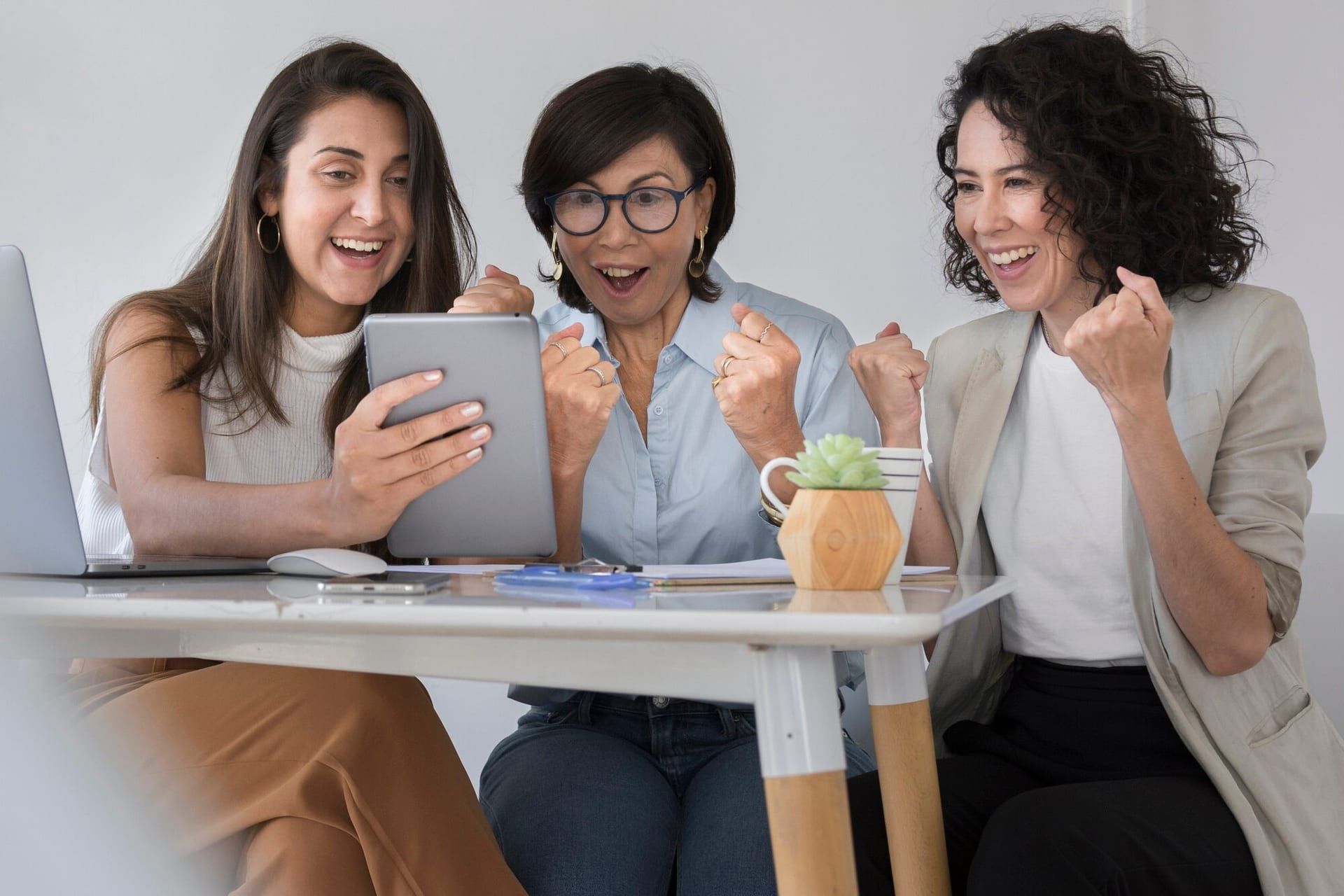 Business Women Looking Something Funny Tablet 23 2148416427