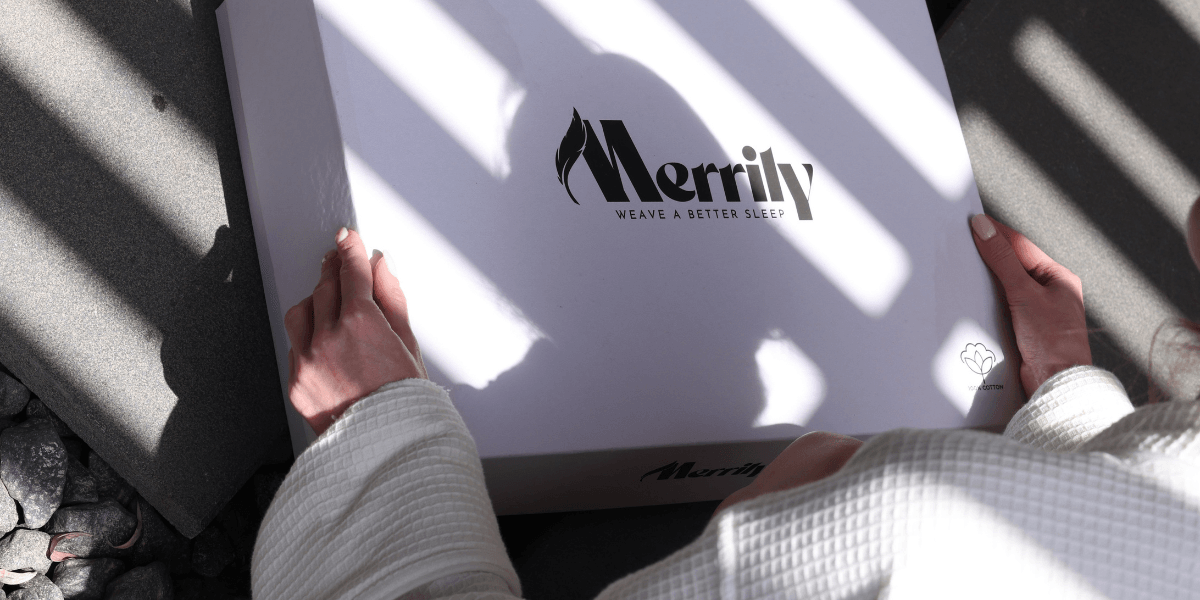 Merrily box being opened, showcasing premium bedding craftsmanship with Turkish cotton.