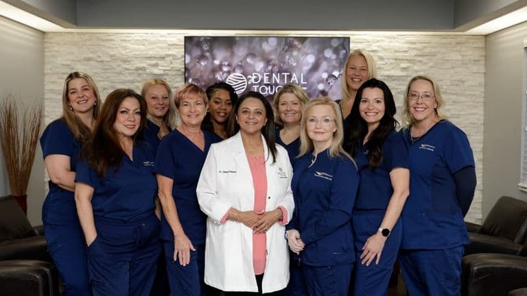 A group photo of Dr. Shireen Dhanani and her team at My Dental Touch Wellness Studio, showcasing compassionate dental care.
