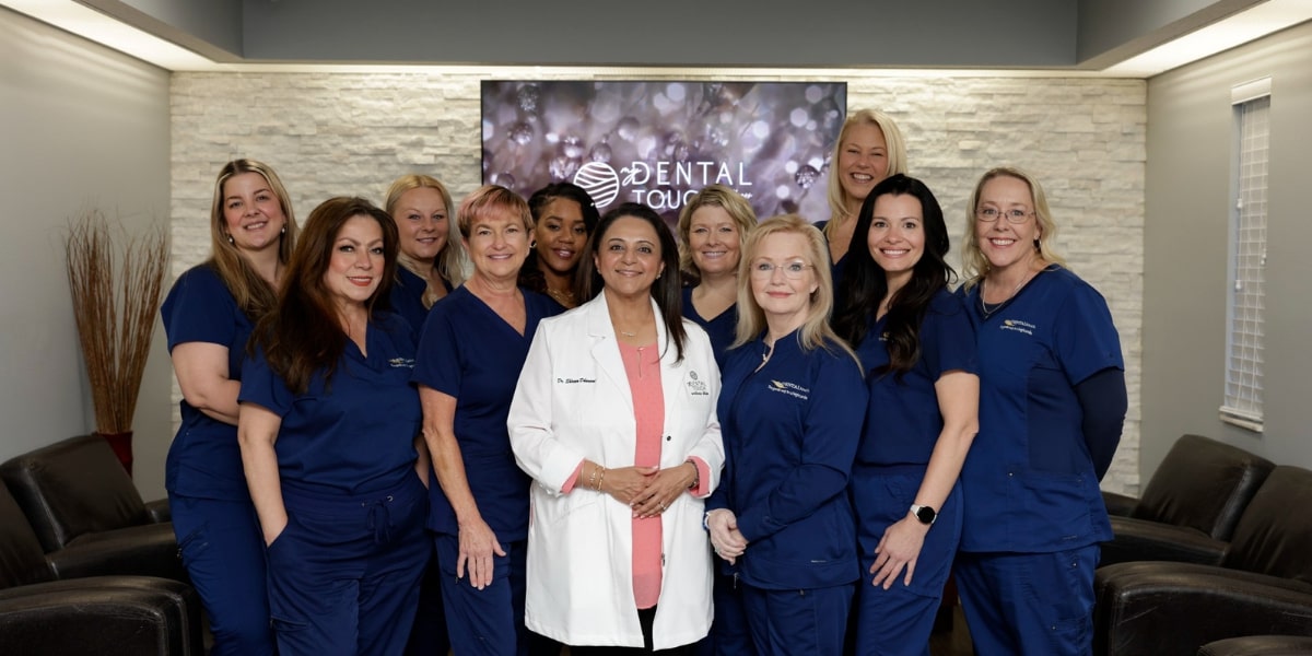A group photo of Dr. Shireen Dhanani and her team at My Dental Touch Wellness Studio, showcasing compassionate dental care.