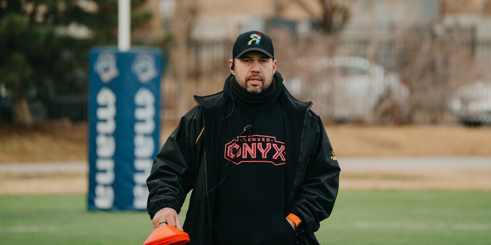 Coach Rob Quickfall guiding players at SAFFA RUGBY, a youth program focused on leadership, teamwork, and resilience.