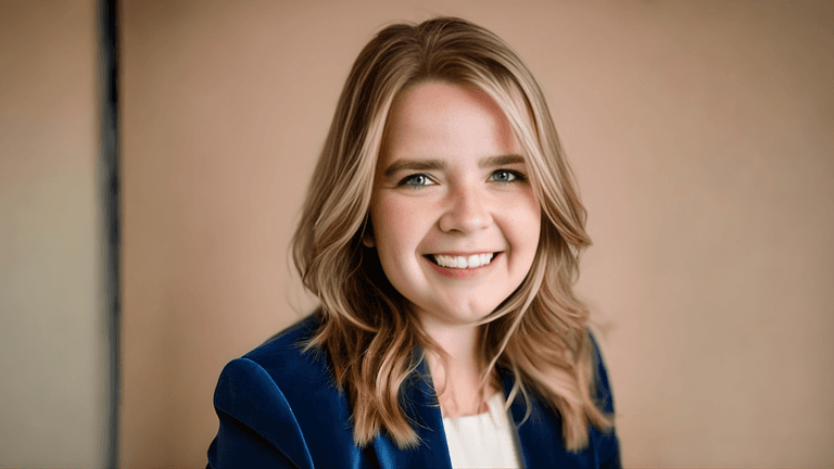 Tiffini Johnson, author and advocate, smiles confidently, embodying her mission to empower survivors through storytelling and literary advocacy.