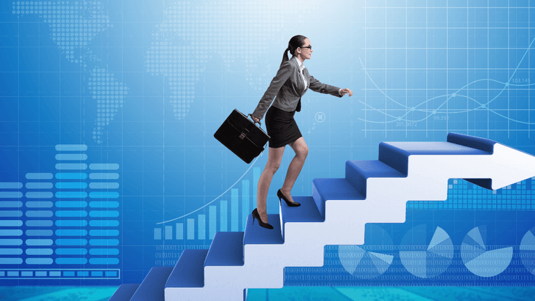 Businesswoman climbing arrow-shaped stairs with a briefcase against a financial data background.