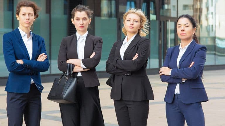 Serious Businesswomen Group With Arms Folded Standing Together Near Office Building Posing Looking Camera Front View Business Team Teamwork Concept 74855 7786
