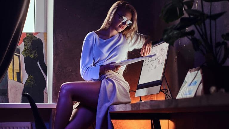 Sexy Blond Woman Is Sitting Table While Reading Important Documents 613910 13252