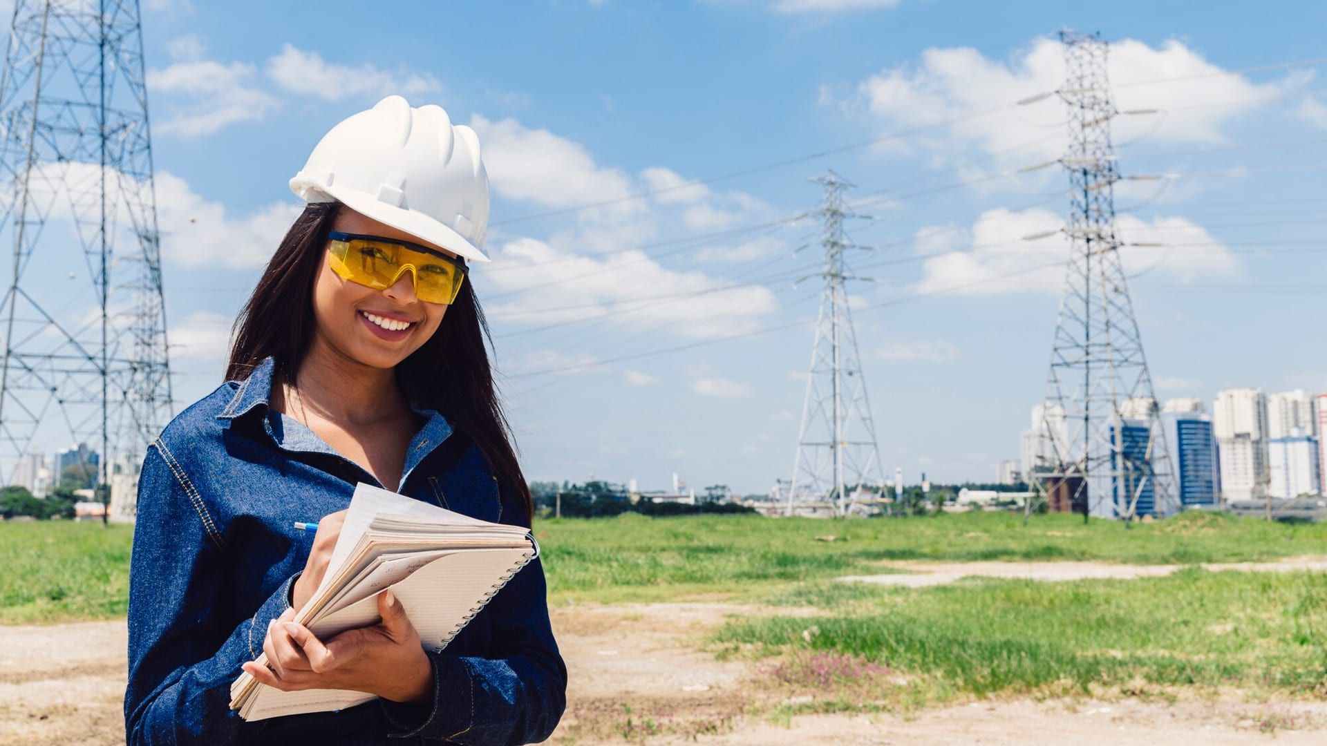 Smiling African American Lady Safety Helmet Taking Notes Near High Voltage Line 23 2148040004
