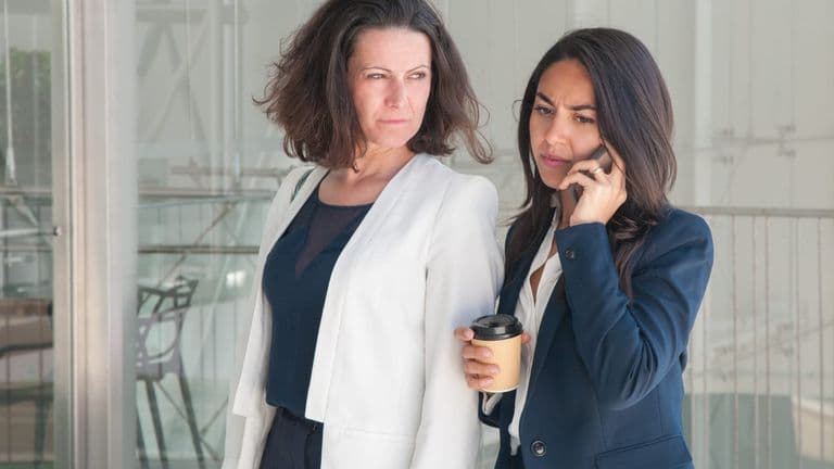 Two Serious Business Women Calling Phone Drinking Coffee 1262 19428