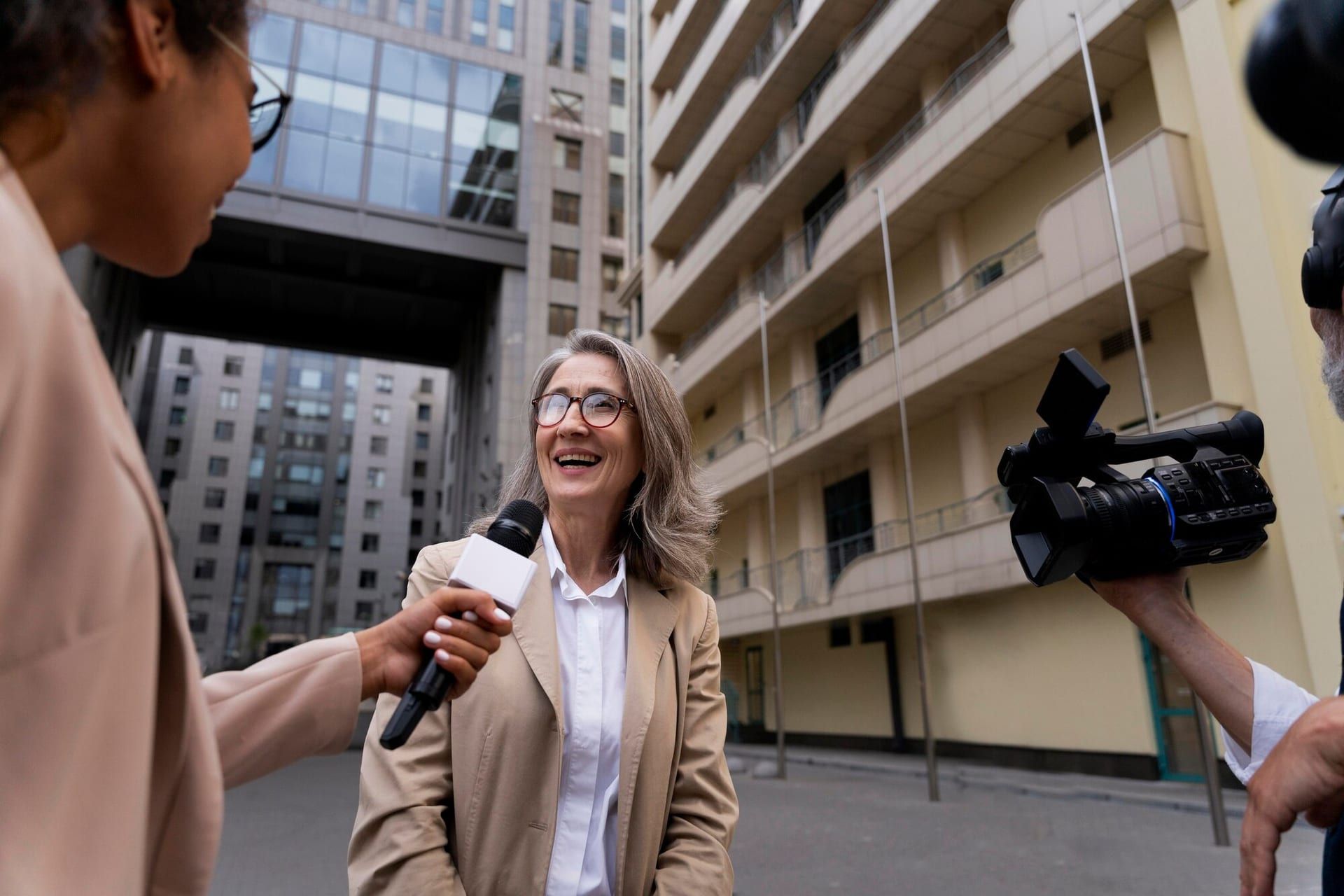 Woman Being Interviewed Outdoors 23 2149032423