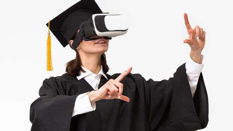 Woman With Graduation Robe Cap Wearing Virtual Reality Headset 23 2148912771